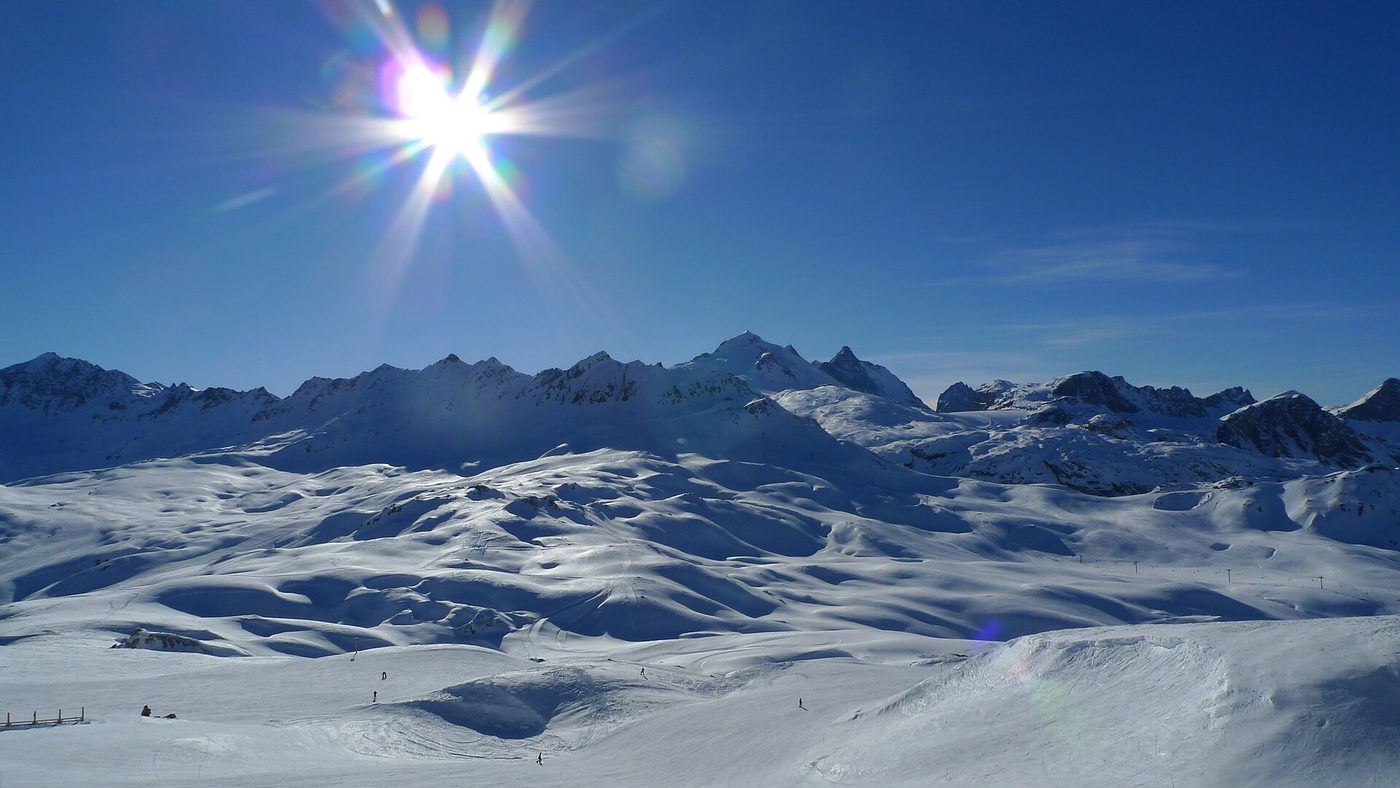 Expansive snowy alpine terrain at Tignes with ski lifts visible against the mountain peaks